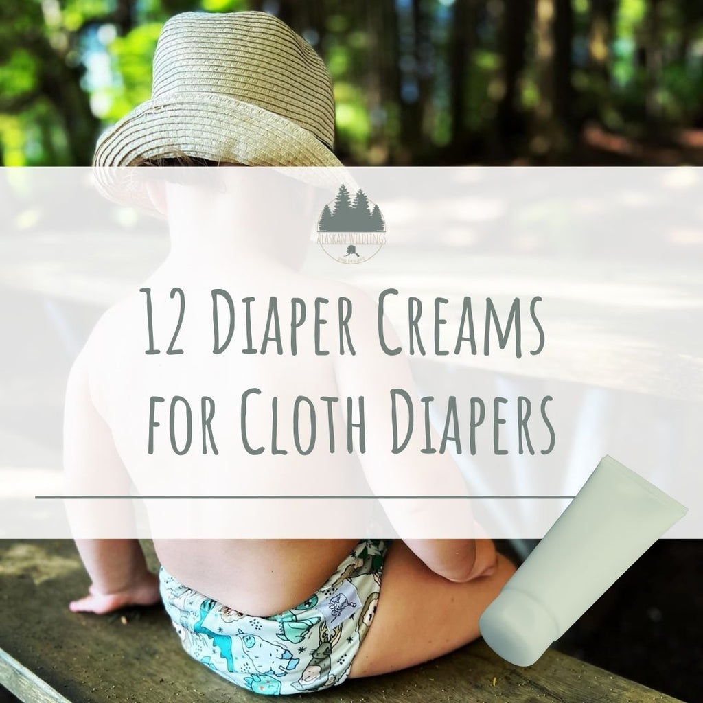 Child in cloth diaper and hat sitting on a picnic table with text that reads, "12 Diaper Creams for Cloth Diapers."