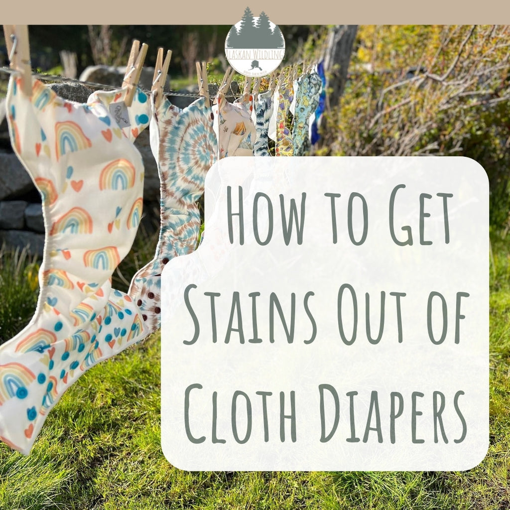 Pocket diapers on a clothesline with the Alaskan Wildlings logo and the text, "How to Get Stains Out of Cloth Diapers."