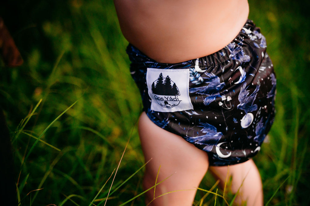 A cloth pocket diaper with athletic wicking jersey interior