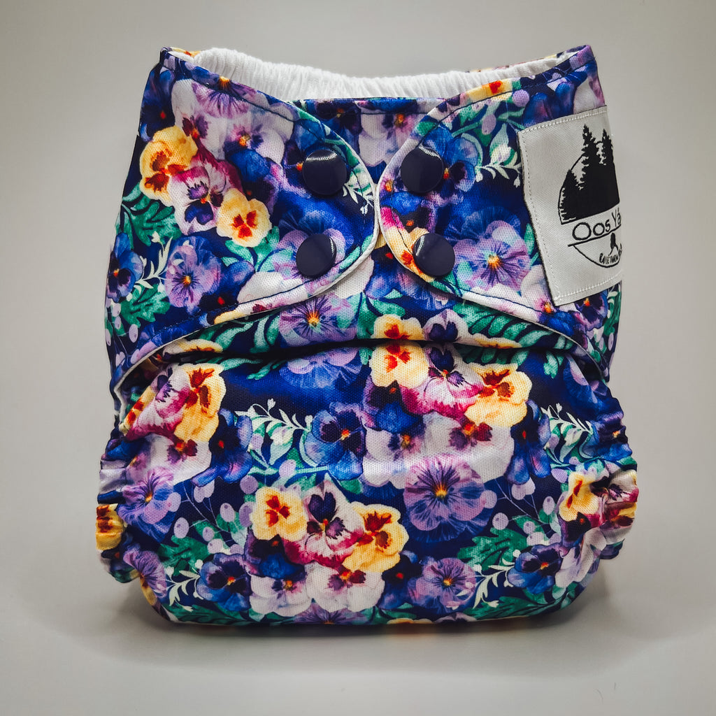 A modern cloth pocket diaper with flowers