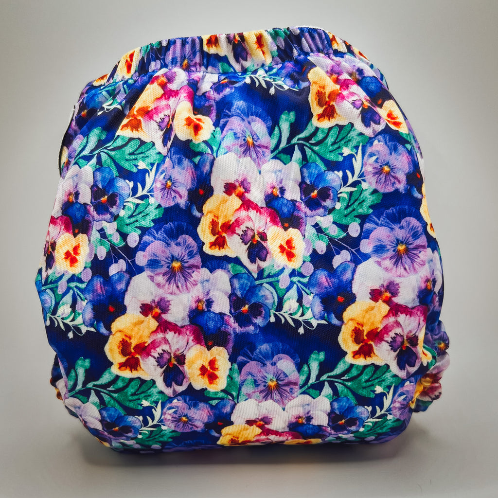 A cloth diaper with a floral design