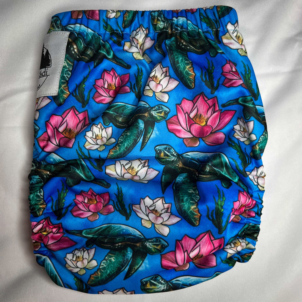 Reusable swim diaper with turtles and flowers