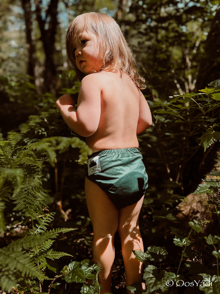A child wearing a reusable cloth diaper